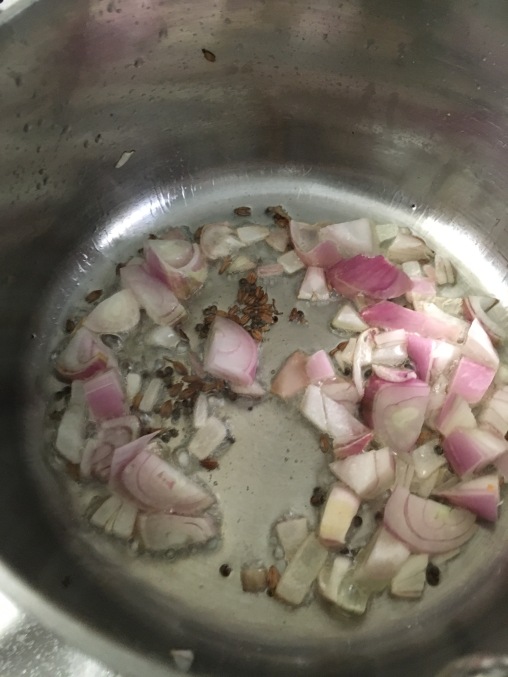 Fry the shallots in 2-3 tsp oil after allowing mustard and cumin to crackle